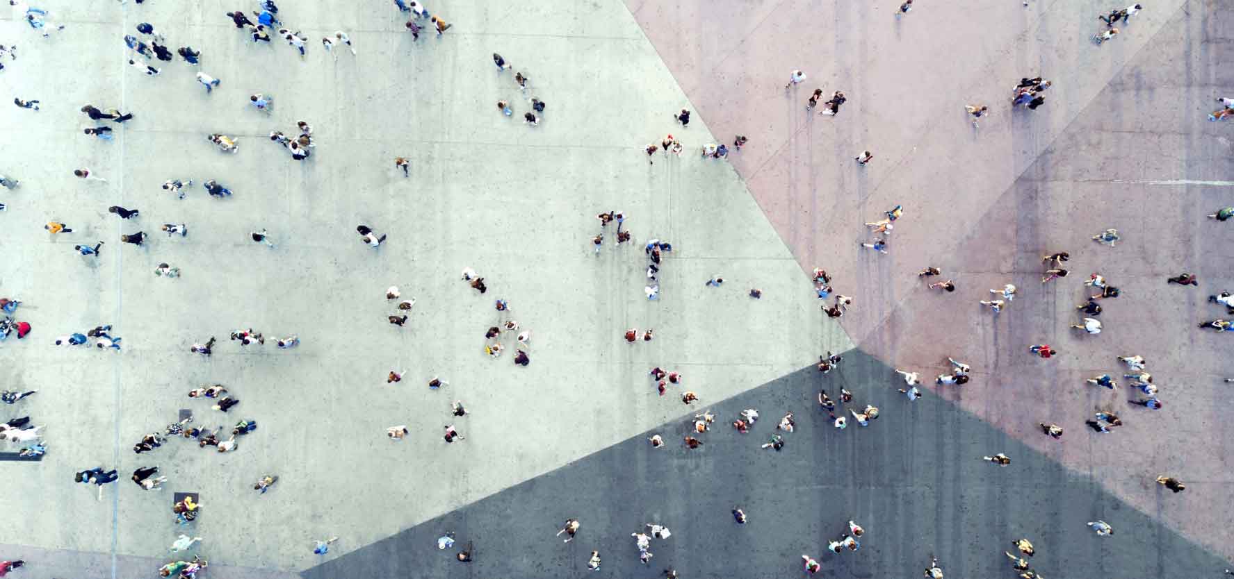 An aerial view of many people walking along a street. Picture: Orbon Alija, iStock